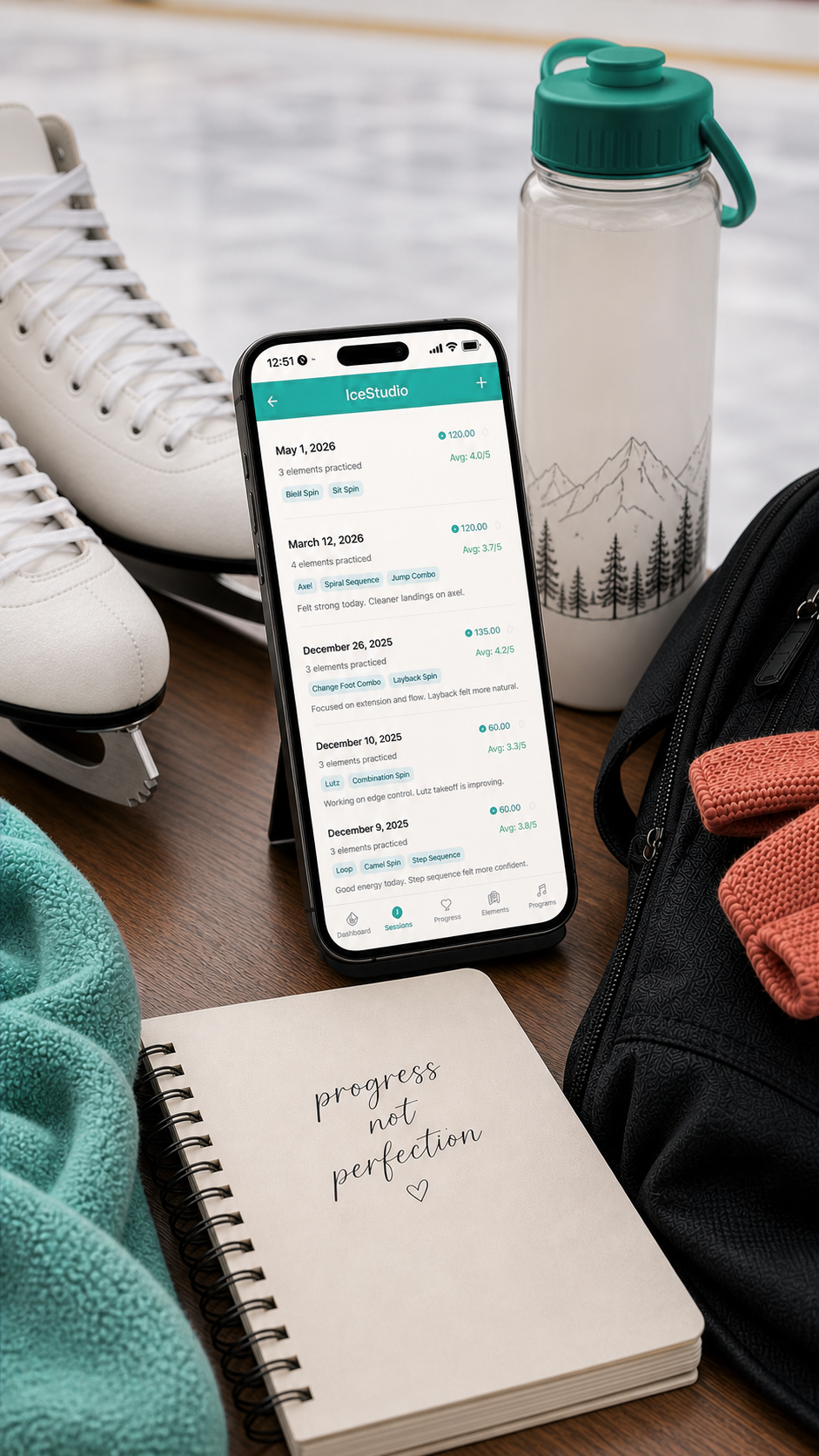 A figure skater's session: white skates, journal reading 'progress not perfection,' coral mittens, water bottle, and the IceStudio app open on a phone showing a list of practice sessions.